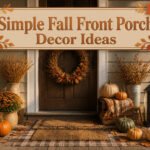 A fall porch with pumpkins, mums, and layered rugs.